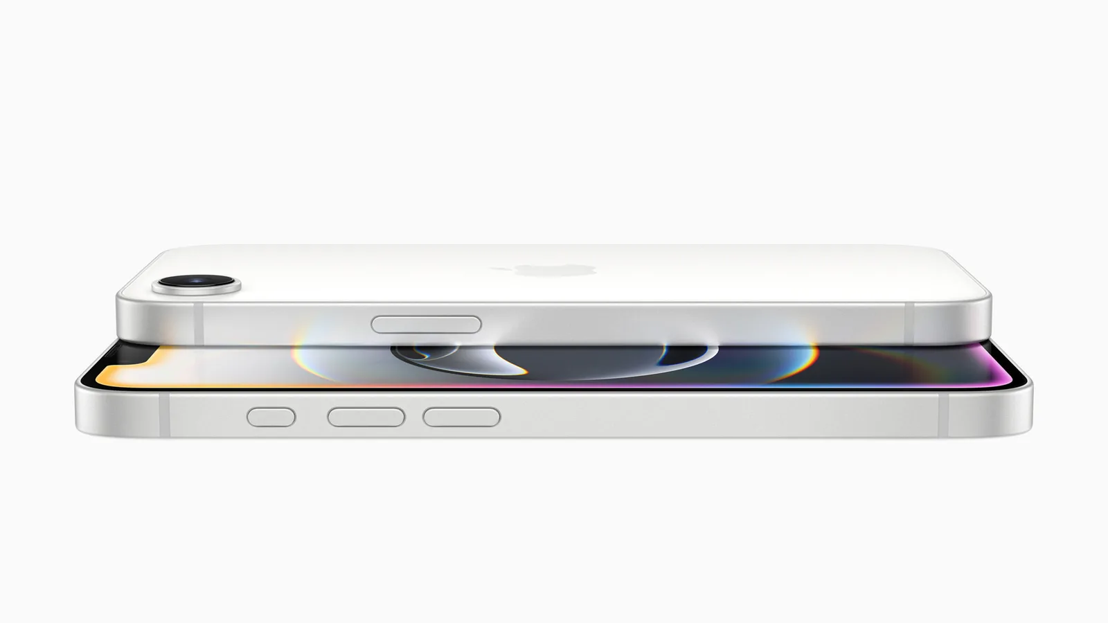 Dva bijela telefona iPhone 16e položena jedan na drugi, snimljena sa strane